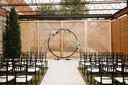 Black Ring, Outdoor Ceremony, Sage Cream Floral Swags.jpg
